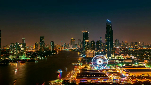 从白天到晚上的时间推移4K分辨率，曼谷市中心的城市景观在晚上，从摩天大楼，泰国。长曝光技术和HDR滤波技术。视频素材