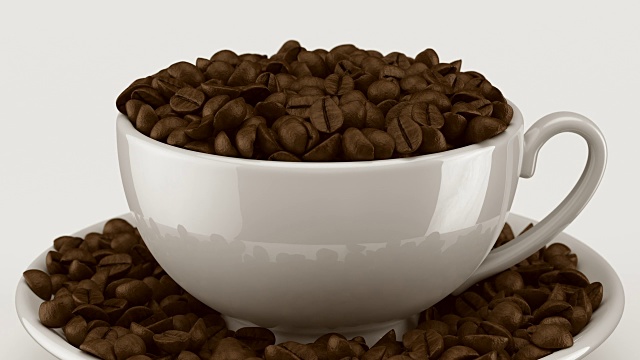 咖啡豆在杯子里旋转视频素材