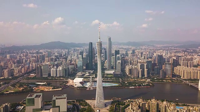 中国阳光明媚的一天广州市区珠江广州塔航拍全景4k时间视频下载