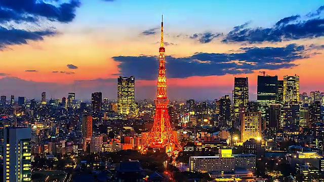 4 k。时间流逝观看日落在东京城市与东京塔在日本视频下载