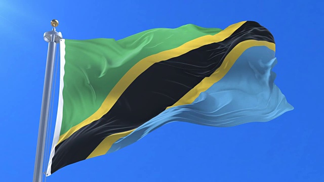 坦桑尼亚的国旗在蓝天中缓缓飘扬，盘旋视频下载