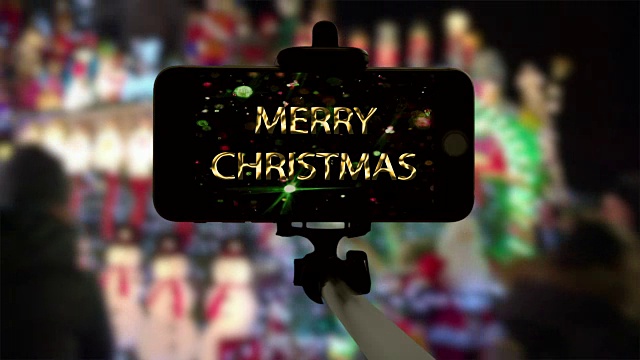 智能手机手机纽约自拍杆圣诞夜灯光视频下载