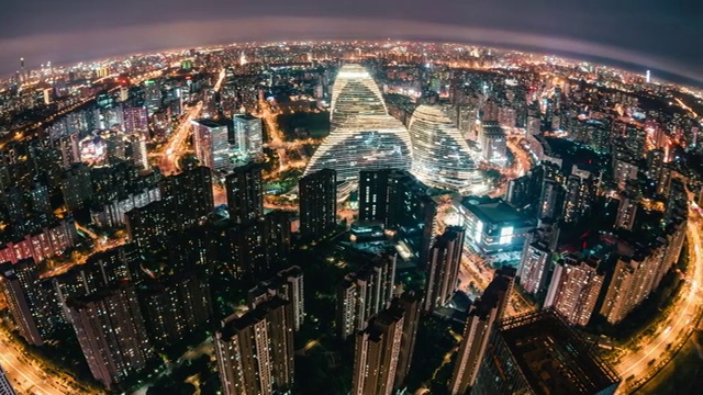 T/L PAN鱼眼和鸟瞰图北京天际线的夜晚视频下载