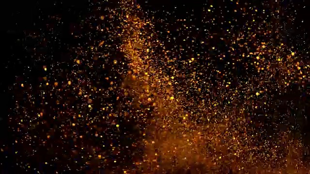 美丽的动画多色飞行闪烁粒子分散在一个黑色的背景视频下载