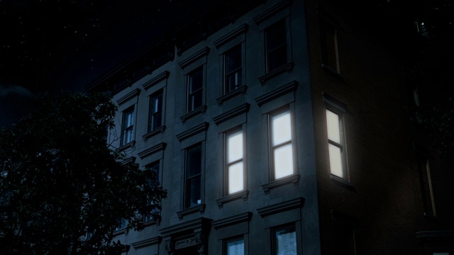 夜间拍摄典型的布鲁克林褐石屋上层视频素材