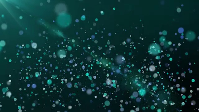 闪光粒子在黑暗的背景，蓝绿色主题视频下载