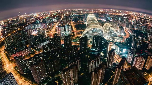 T/L PAN鱼眼和鸟瞰图北京天际线的夜晚视频下载