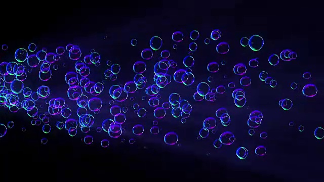 彩虹泡泡在黑暗的背景上视频素材