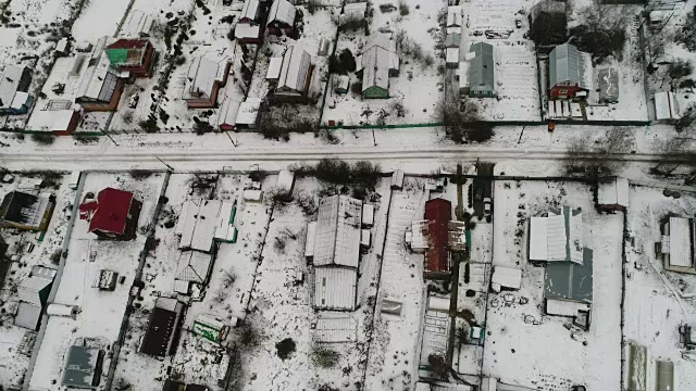 雪下的乡村村庄，被无人机看到视频下载