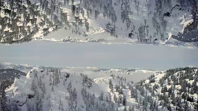 迷幻冬季空中背景镜雪山视频购买