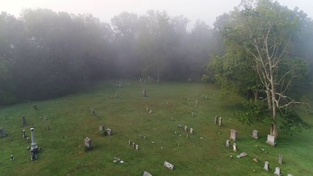 前航拍大雾俯瞰历史公墓视频素材