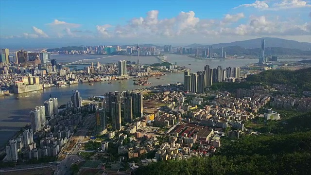 阳光明媚的一天，珠海城市景观，澳门城市湾航拍全景4k中国视频下载