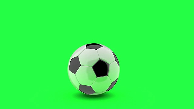 足球在色度键绿色背景上跳跃。视频素材