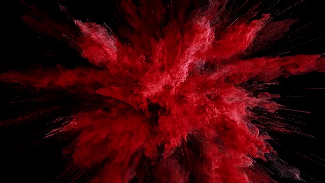 黑色背景下红色火药爆炸的Cg动画。慢动作动作，开始有加速。有α无光视频素材