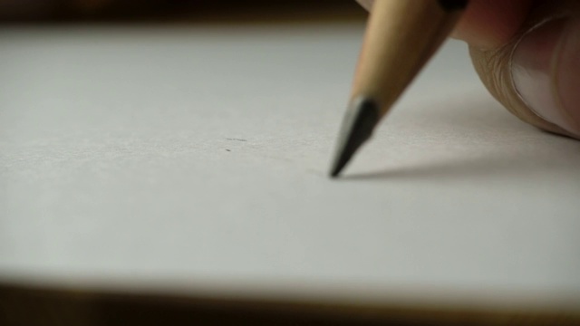 艺术家手绘木笔在纸上书写视频素材