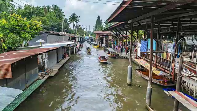 4K时间流逝游客在泰国Damnoen Saduak水上市场视频素材