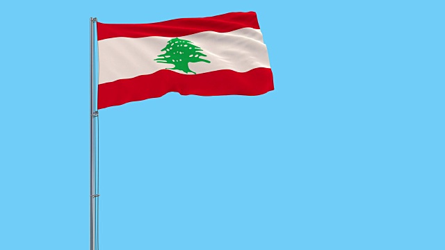 孤立的黎巴嫩国旗上的旗杆在风中飘扬的蓝色背景，3d渲染视频下载