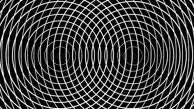 两个脉动的圆圈在黑色背景上形成同心的白色环视频素材