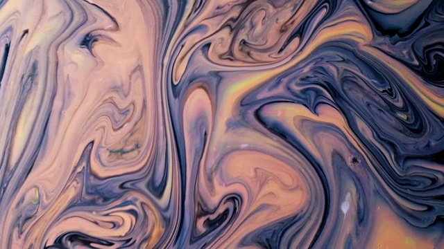 抽象的迷幻的背景。多色油墨在牛奶中缓慢地漂浮视频素材