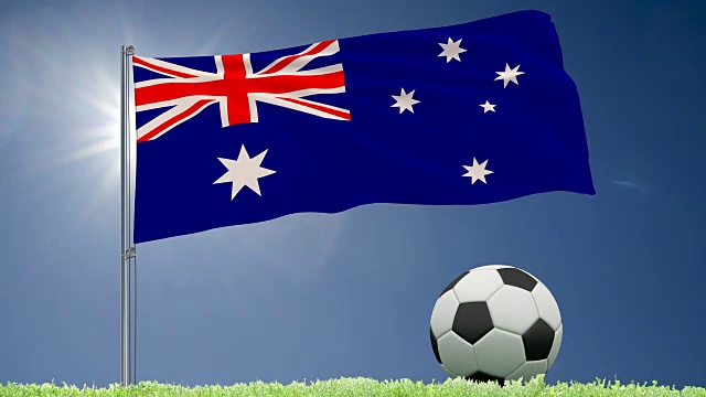 草坪上飘扬的澳大利亚国旗和滚动的足球，3d渲染，4k视频视频下载