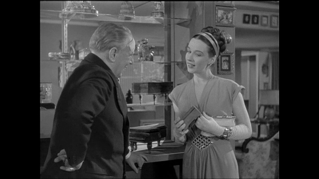 1946年，一名女子(帕特里夏·莫里森饰)沉迷于他的音乐盒视频下载