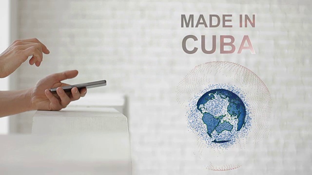 手启动地球全息图和古巴制造的文本视频素材