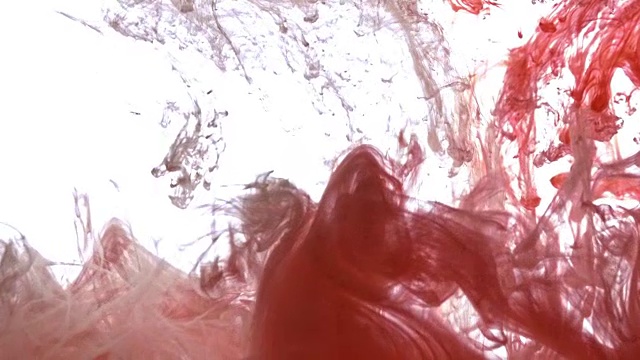 红色和白色的丙烯酸漆云喷在白色的背景上。视频素材