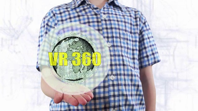 年轻人展示了地球的全息图和文本VR 360视频下载