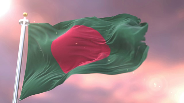 日落时，孟加拉国国旗在风中缓缓飘扬视频下载