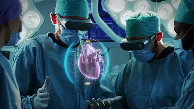 外科医生使用增强现实技术进行心脏手术。使用3D动画和手势进行心脏移植手术。互动动画显示生命体征。未来的医院。视频下载