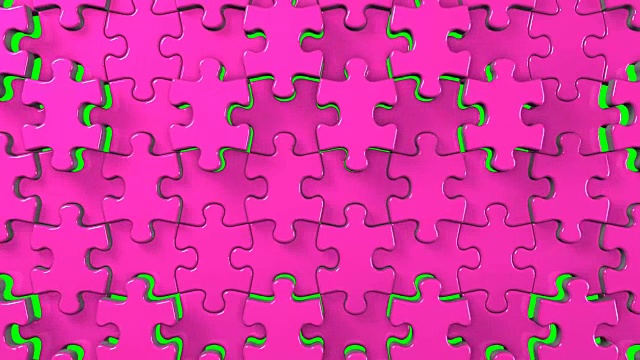 粉红色拼图在绿色的关键视频下载