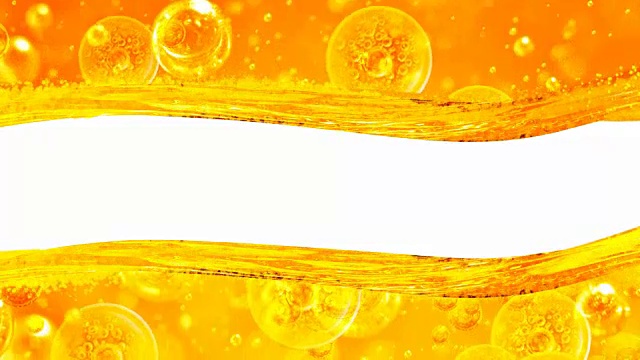 金色两波白色背景与泡沫金色液体项目，油，蜂蜜，啤酒，果汁或其他变种。文本的位置视频下载