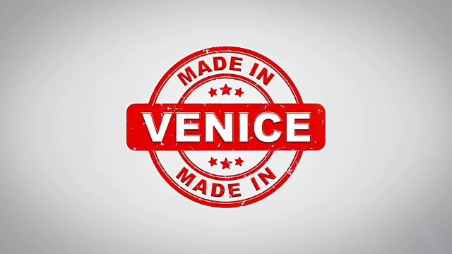 威尼斯制作签名盖章文字木制邮票动画。红色墨水在干净的白纸表面背景与绿色哑光背景包括在内。视频素材