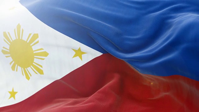 菲律宾国旗缓缓飘扬的背景。4k近距离展示旗帜。无缝循环视频下载