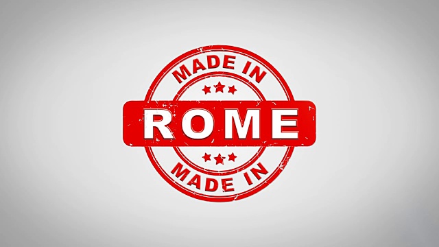 罗马制作签名盖章文字木制邮票动画。红色墨水在干净的白纸表面背景与绿色哑光背景包括在内。视频下载