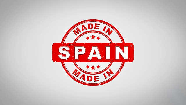 西班牙制作签名盖章文字木制邮票动画。红色墨水在干净的白纸表面背景与绿色哑光背景包括在内。视频下载