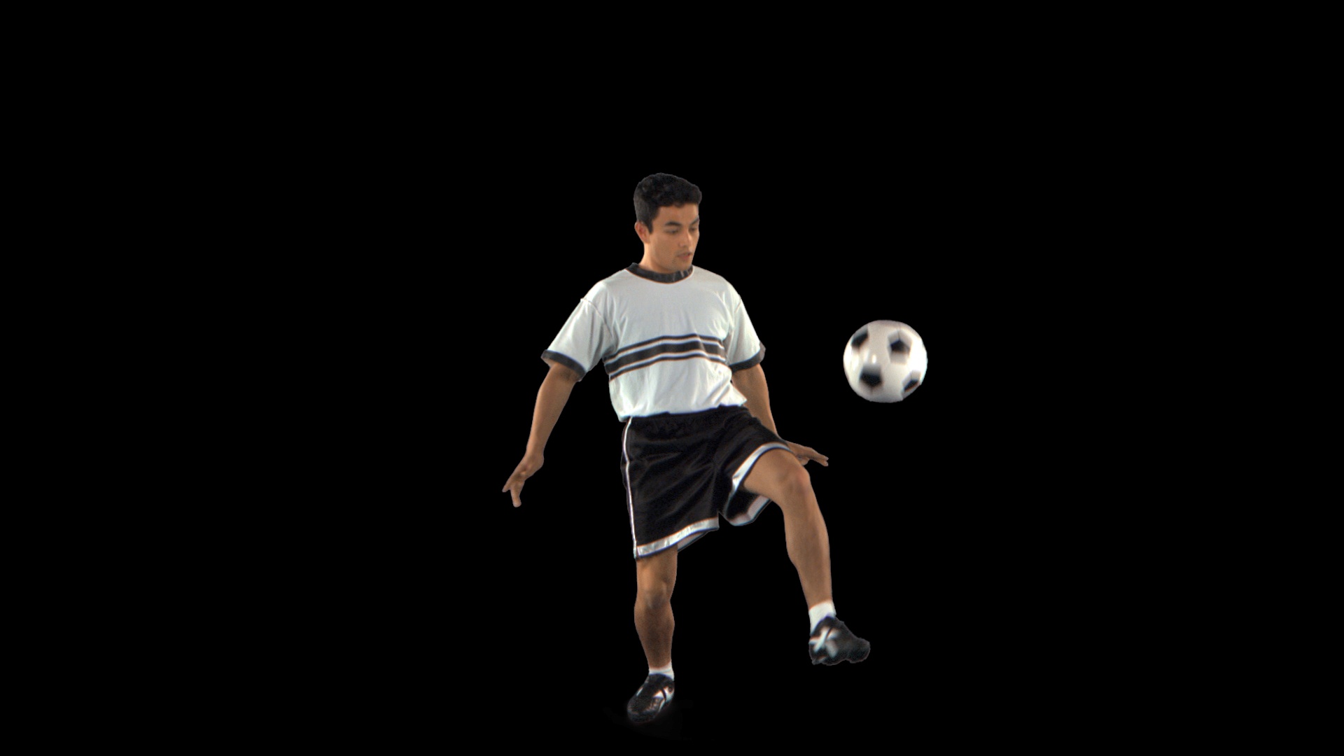 足球运动员杂耍球-这个剪辑有一个嵌入式阿尔法频道视频下载