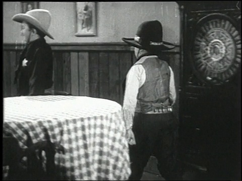 1938年，蒙太奇歌手和钢琴家表演在电影“恐怖的小镇”作为强硬的牛仔进入酒吧与治安官/美国视频下载